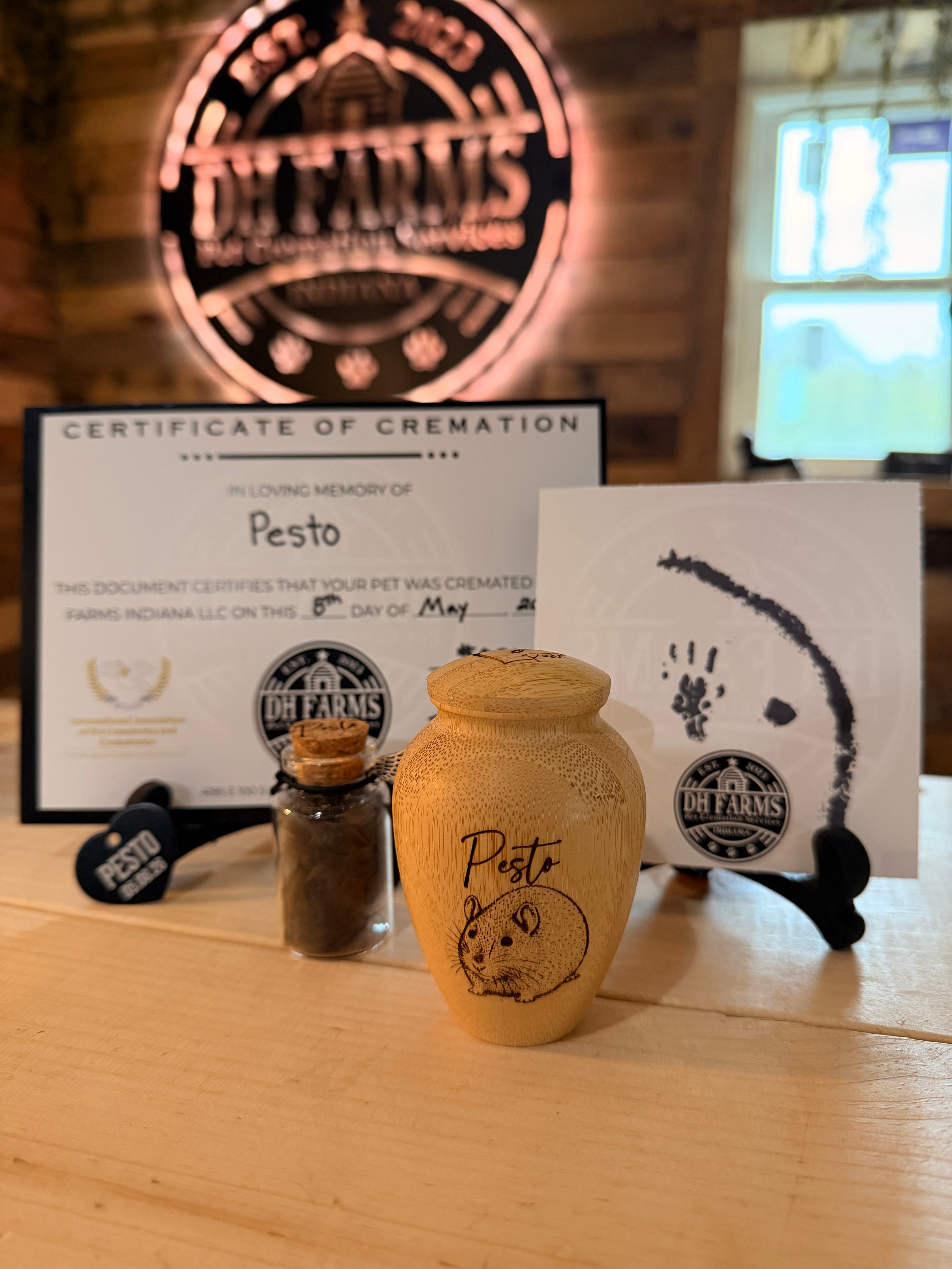 This package includes the following and is intended for the bird, rodent, or reptile family members under 2 pounds.

-Private cremation
-Fur clipping in engraved envelope or glass jar (Most Appropriate)
-Mini bamboo urn with custom engraving
-Ink print if possible
-Certificate of cremation